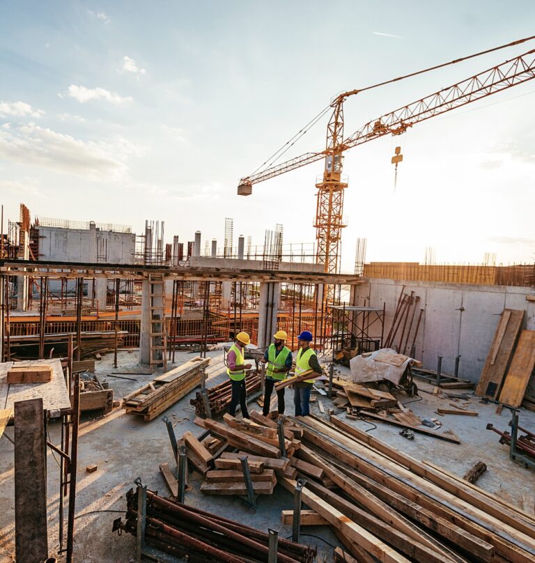 Investors and contractors on construction site